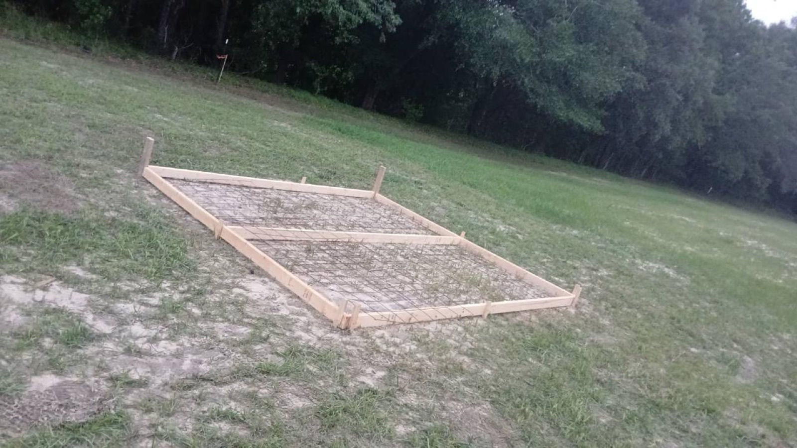 Wood forms and steel wire mesh reinforcement for a concrete patio in Savannah GA