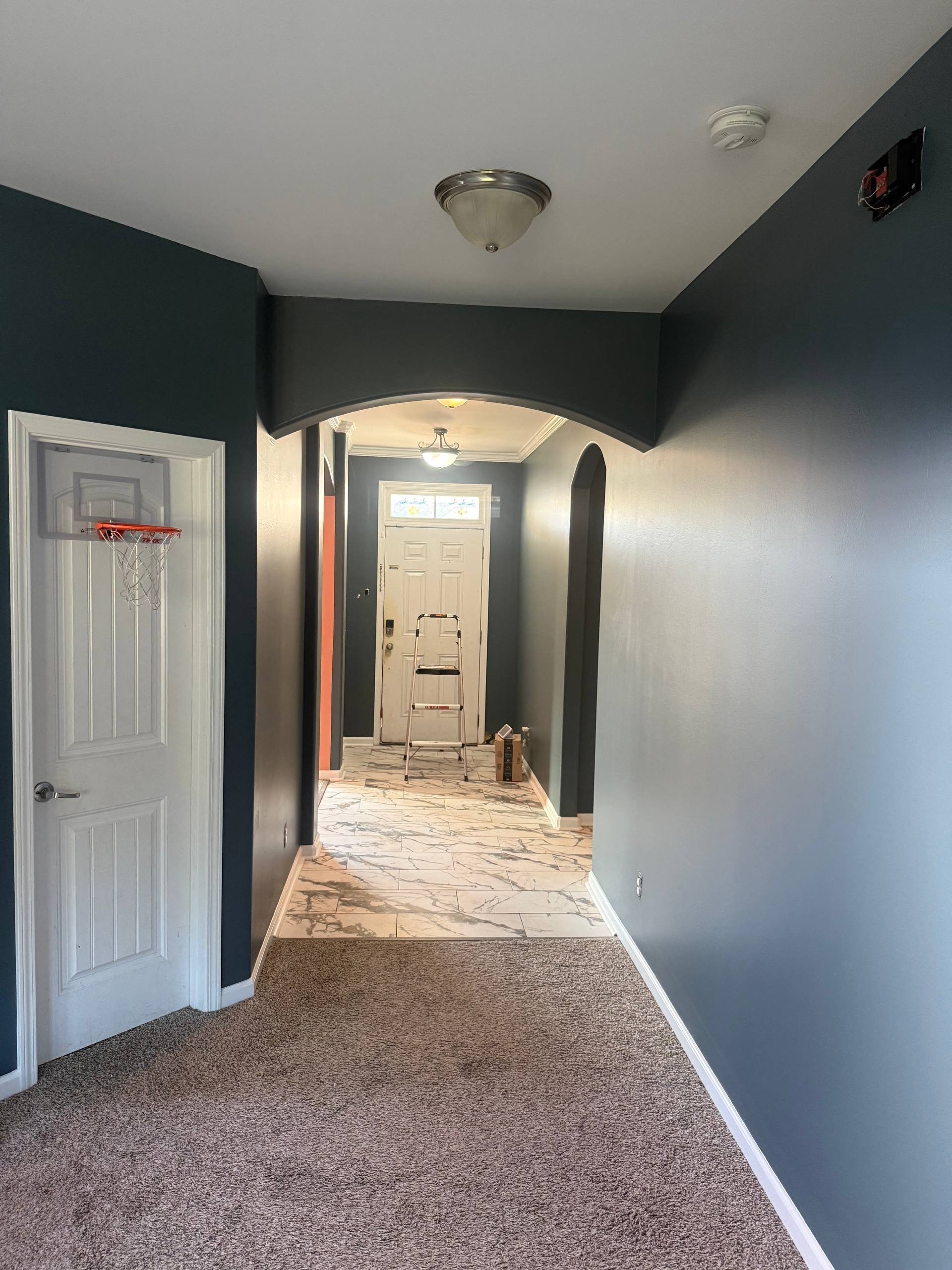 After - Blue Marine painted hallway with archway in Richmond Hill GA by Global Painting