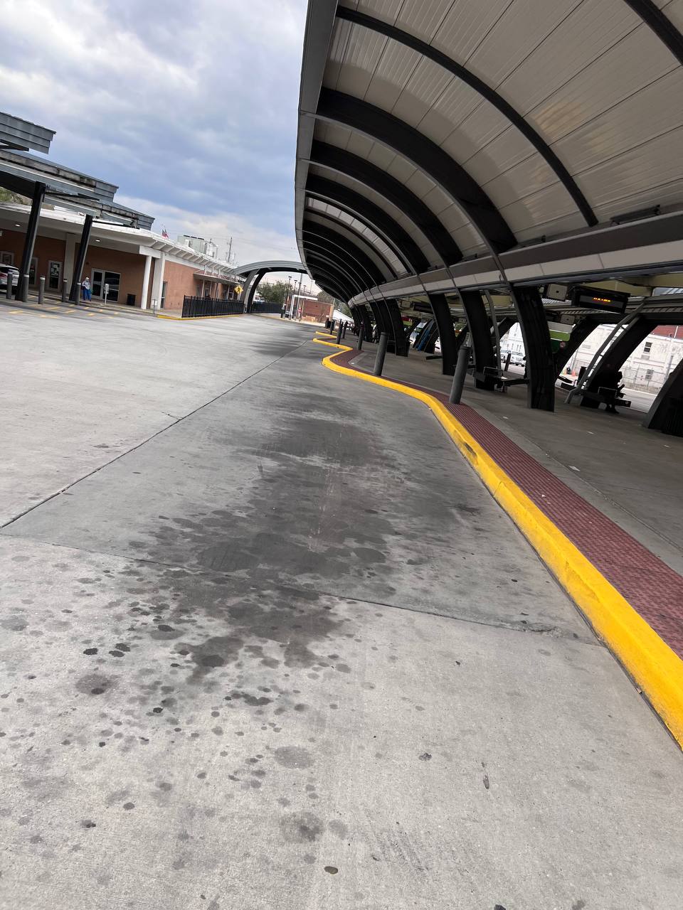 Daytime view of fresh curb paint at CAT Bus Station Savannah