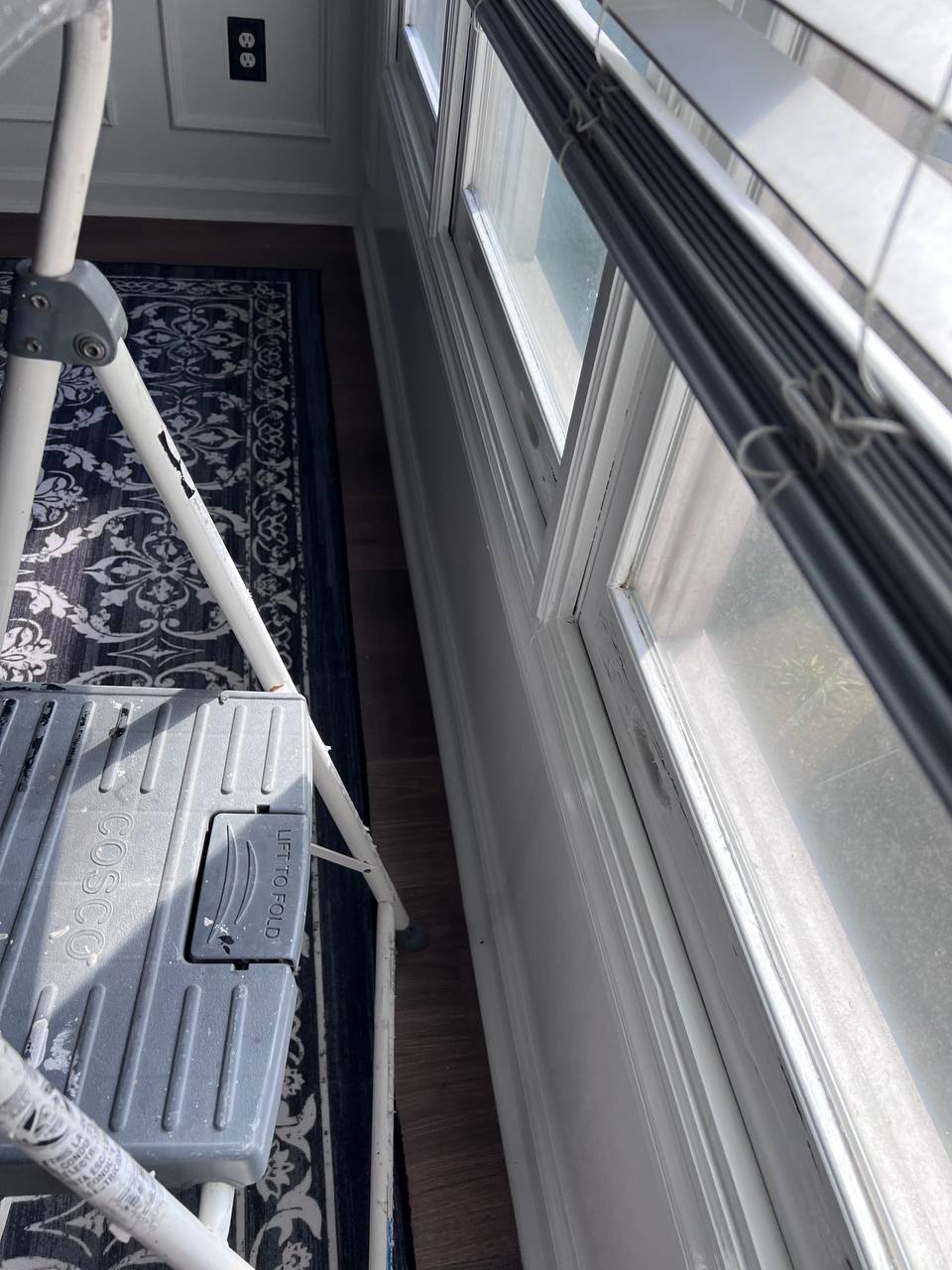 Detail of professionally painted white window trim