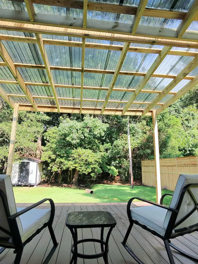 New composite deck with pergola over the same patio