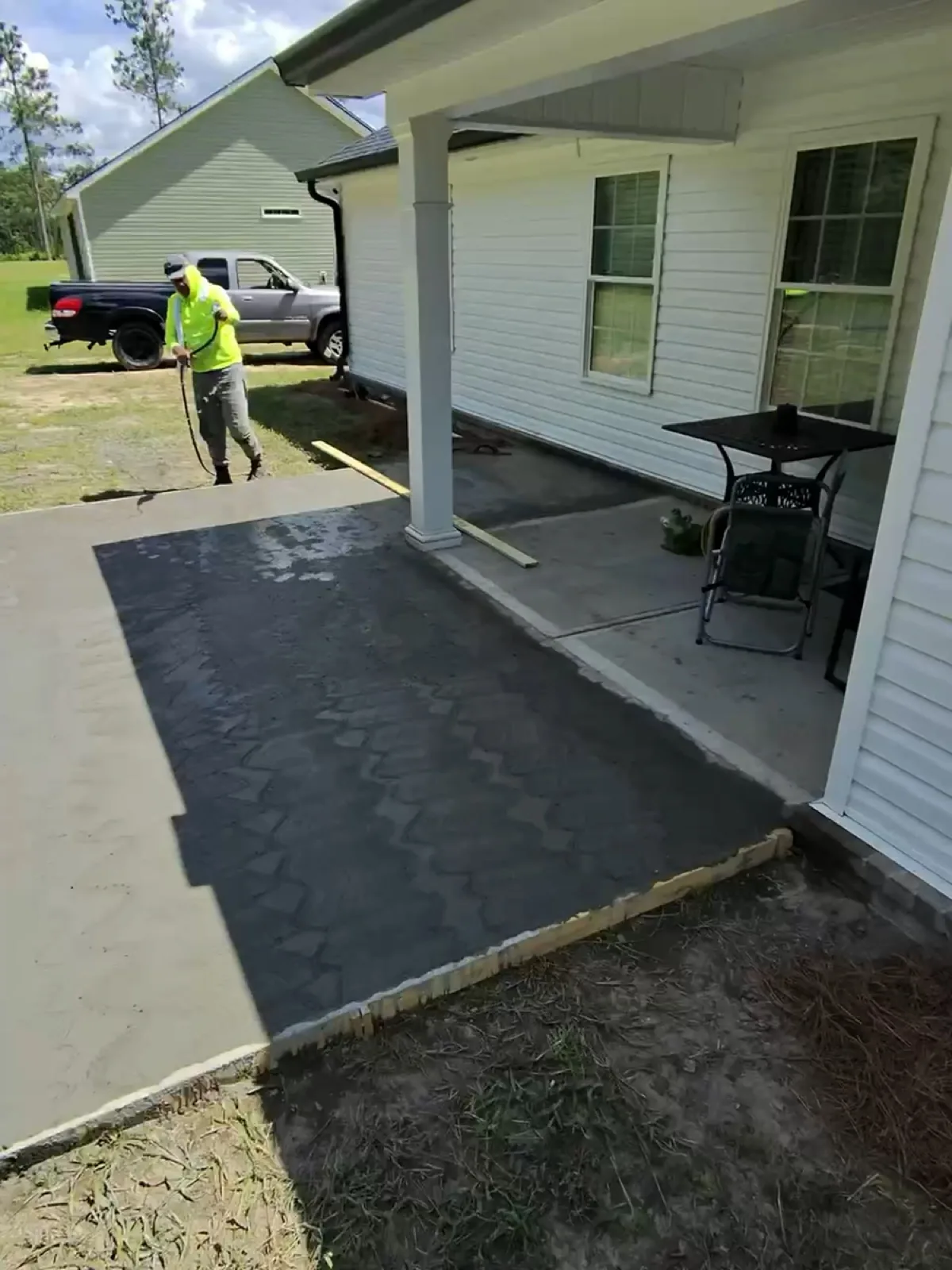 She wanted more room out back — so we poured her the patio to prove it