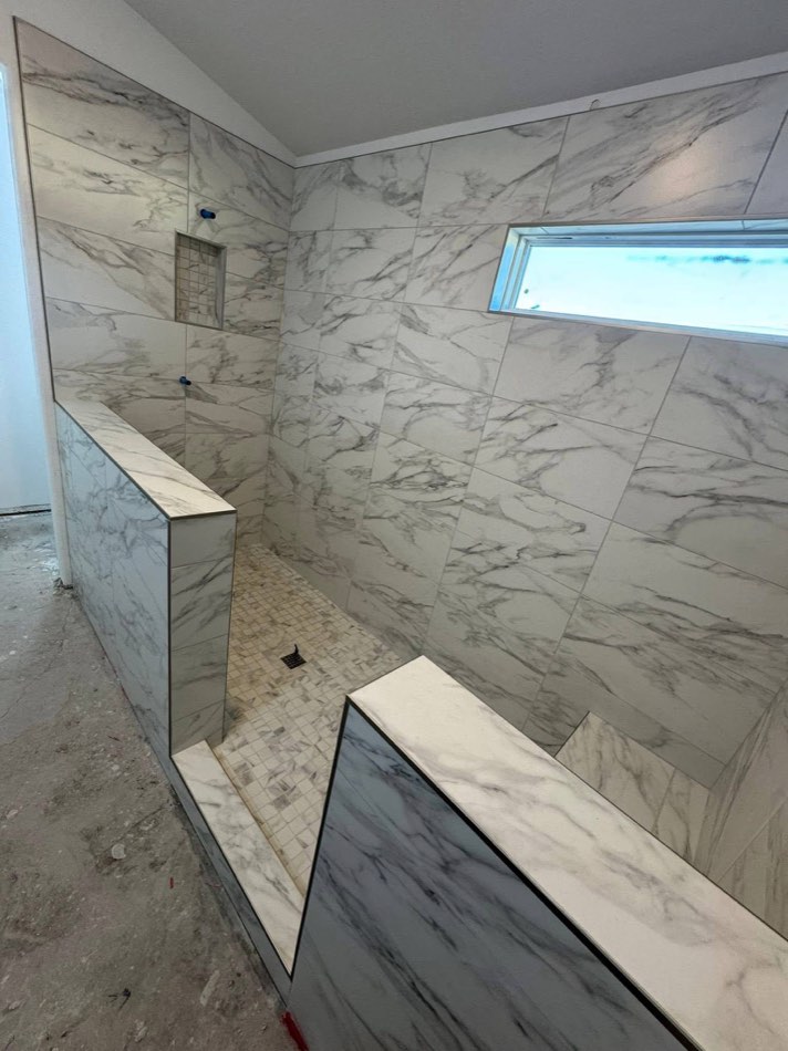 08 / Mosaic floor · Pebble shower