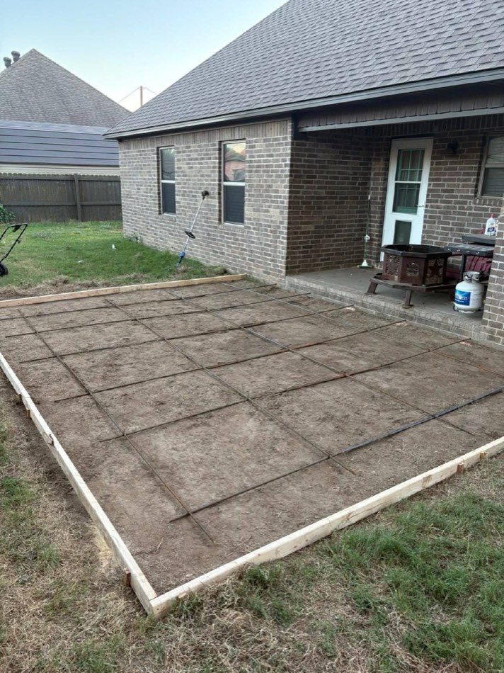 Rebar grid laid in wood formwork ready for pour
