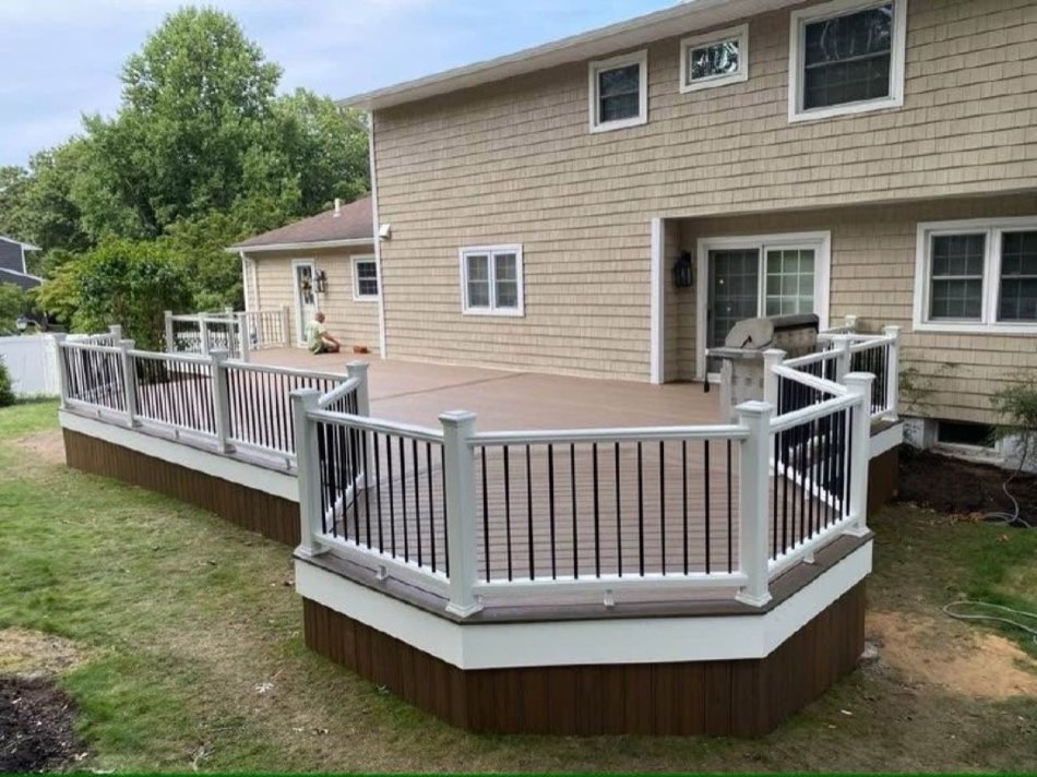 Two-tier composite deck with white and black railings