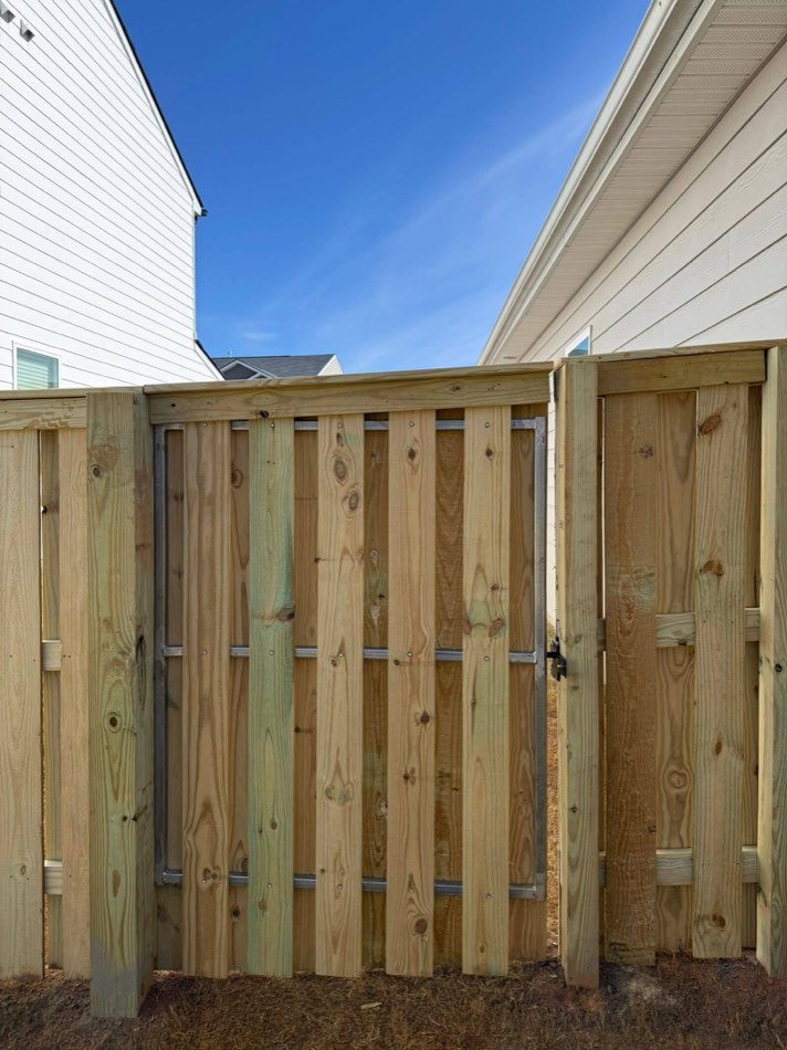 12 / Property line · Run with brick home