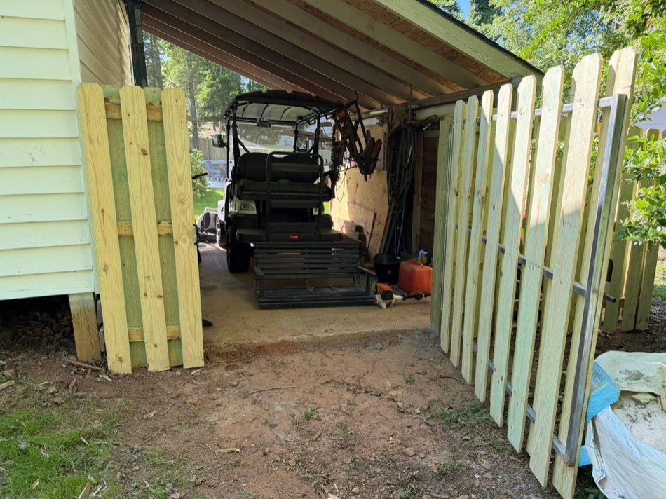 15 / Carport enclosure · Mid-build