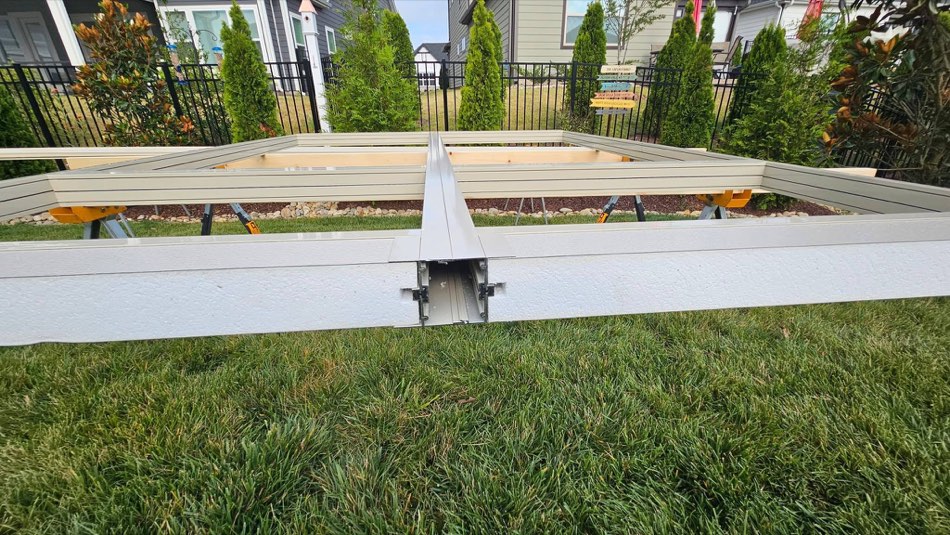 Tight framing detail close-up showing baseplate construction